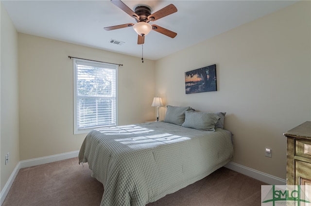 carpeted bedroom featuring ceiling fan