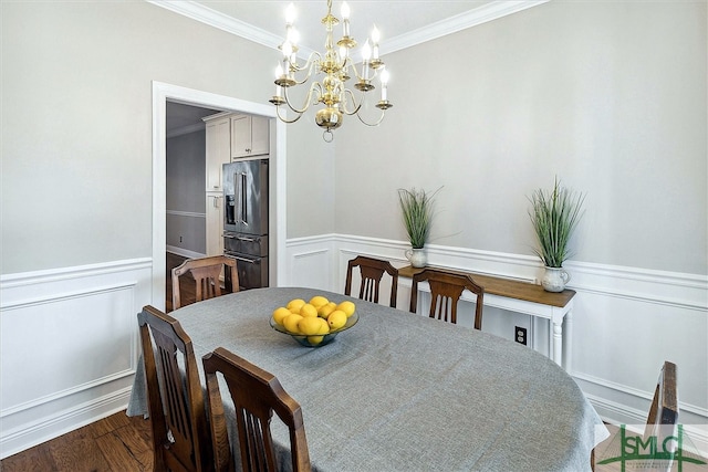 dining area with a notable chandelier, dark hardwood / wood-style floors, and crown molding