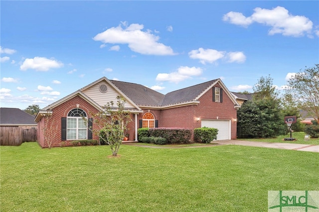 view of front of property with a garage and a front yard