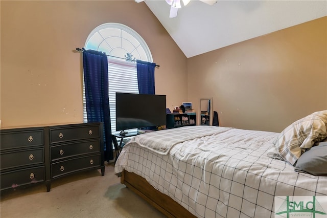 carpeted bedroom featuring ceiling fan and high vaulted ceiling