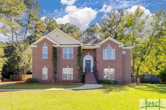 view of front of home with a front lawn