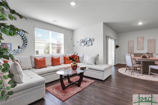 living room with dark wood-type flooring