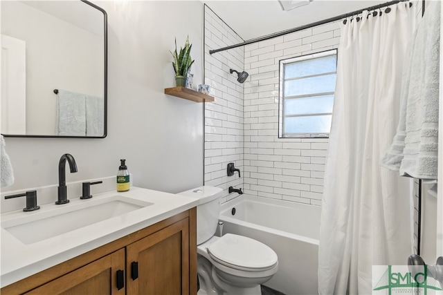 full bathroom with shower / tub combo, vanity, and toilet