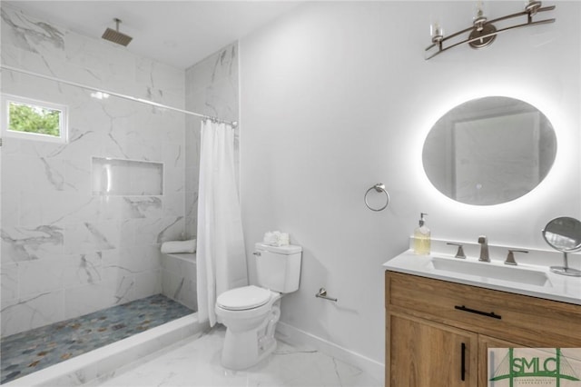 bathroom with vanity, curtained shower, and toilet