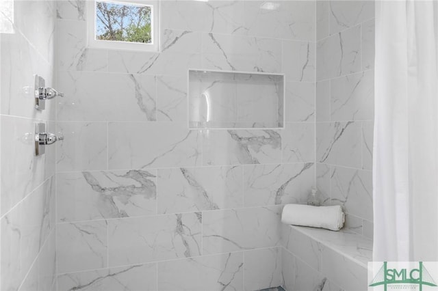 bathroom featuring a shower with curtain