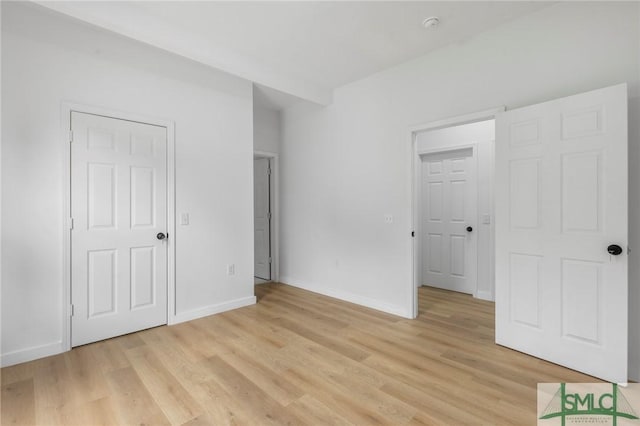 unfurnished bedroom featuring light hardwood / wood-style flooring