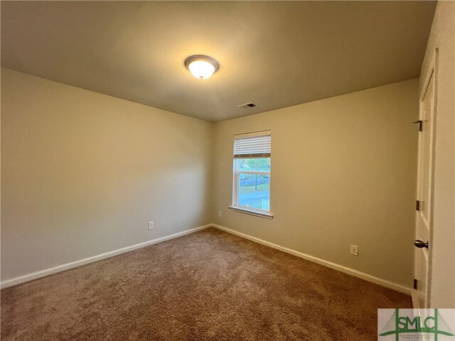 view of carpeted spare room