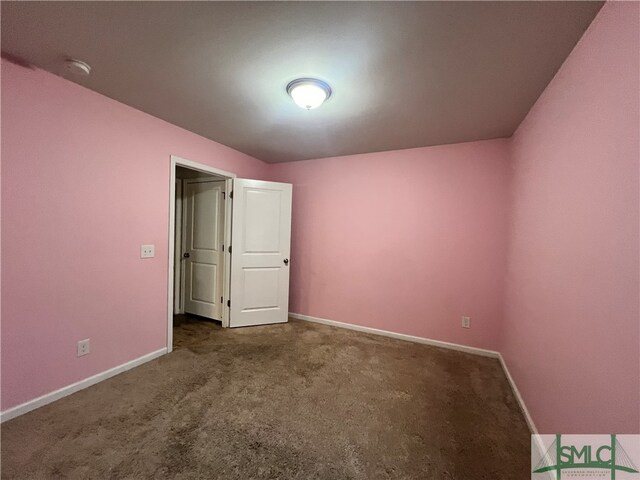 unfurnished bedroom with carpet floors