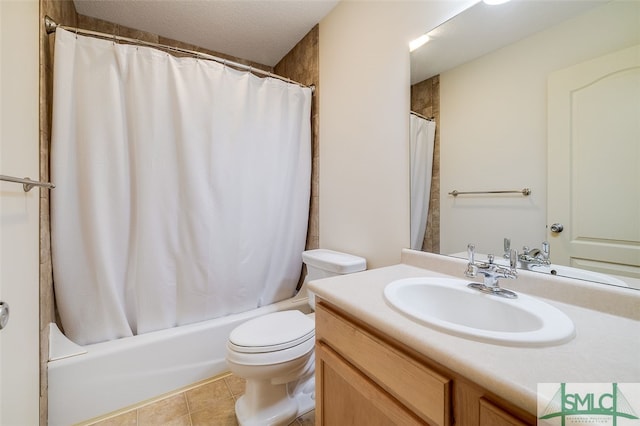 full bathroom with shower / bath combo, tile patterned flooring, a textured ceiling, toilet, and vanity