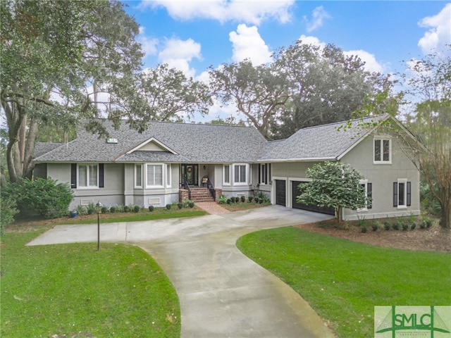 ranch-style home featuring a garage and a front lawn