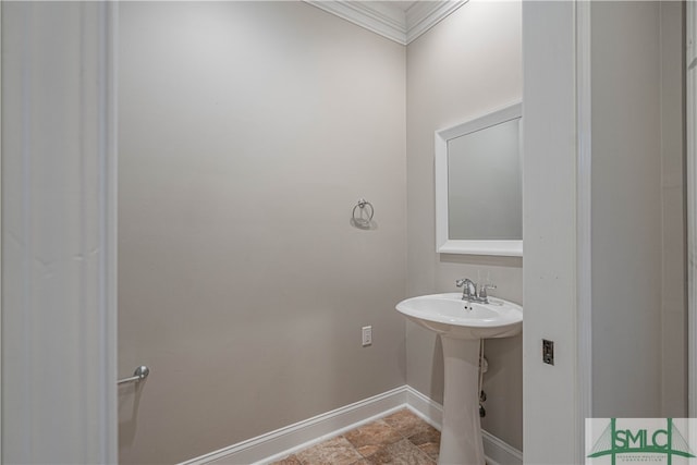 bathroom with crown molding