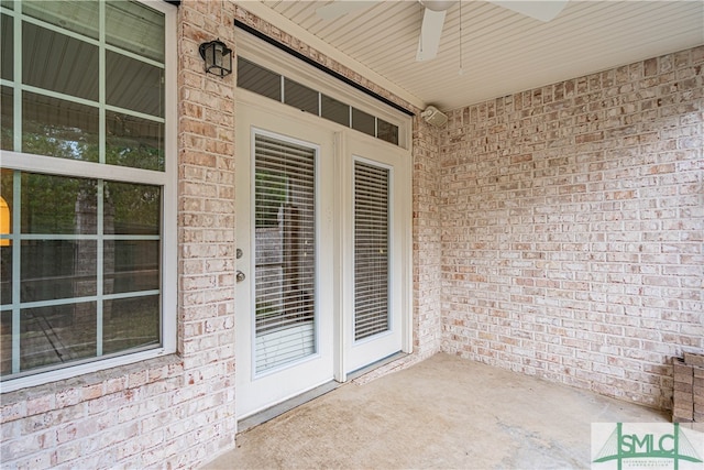 view of patio / terrace featuring ceiling fan