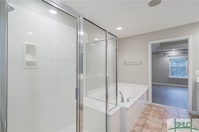 bathroom with vanity and plus walk in shower