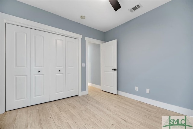 unfurnished bedroom with a closet, ceiling fan, and light hardwood / wood-style floors