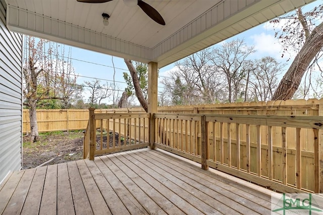 wooden deck with ceiling fan