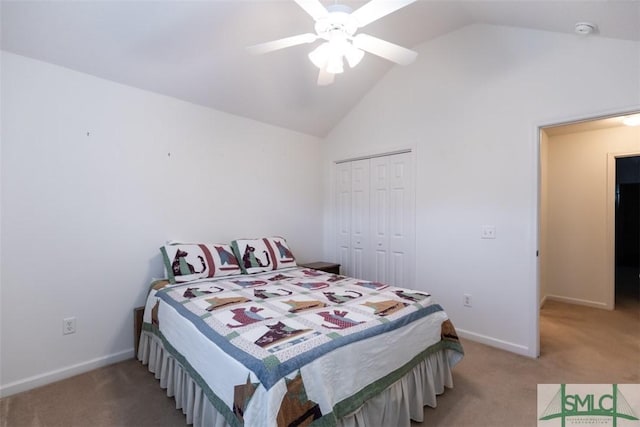 bedroom featuring carpet flooring, ceiling fan, a closet, and lofted ceiling