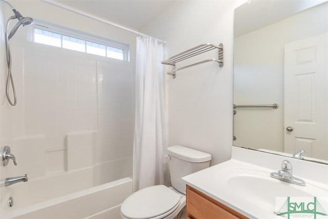 full bathroom with toilet, vanity, and shower / tub combo with curtain