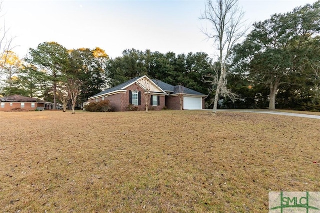 single story home with a garage