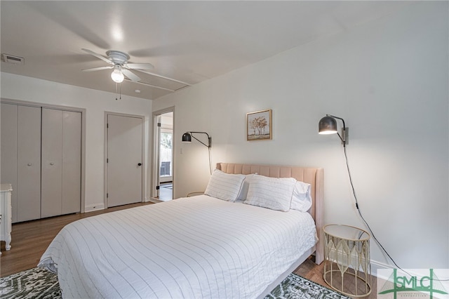 bedroom featuring ceiling fan and wood-type flooring