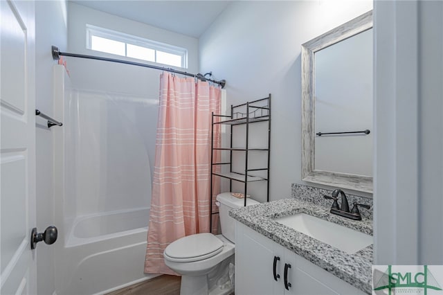 full bathroom featuring hardwood / wood-style floors, vanity, toilet, and shower / bath combination with curtain