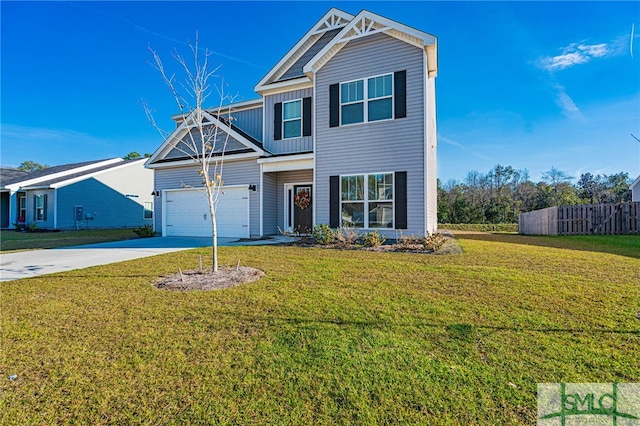 view of front of house featuring a front lawn and a garage