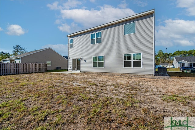 rear view of property with a patio area