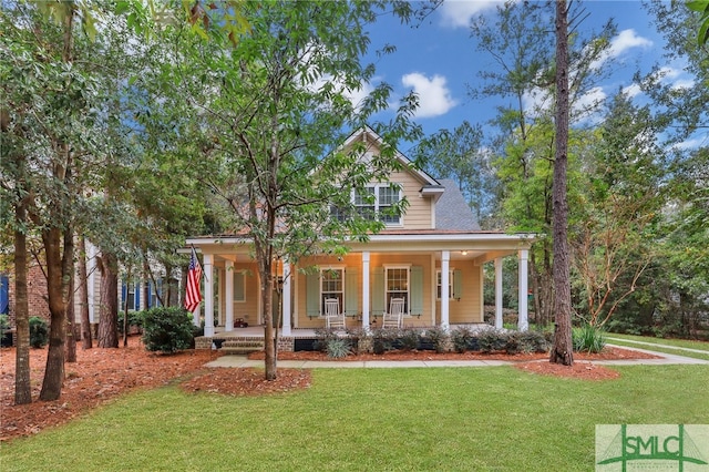 view of front of property featuring a porch and a front lawn