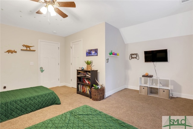 carpeted bedroom featuring vaulted ceiling and ceiling fan