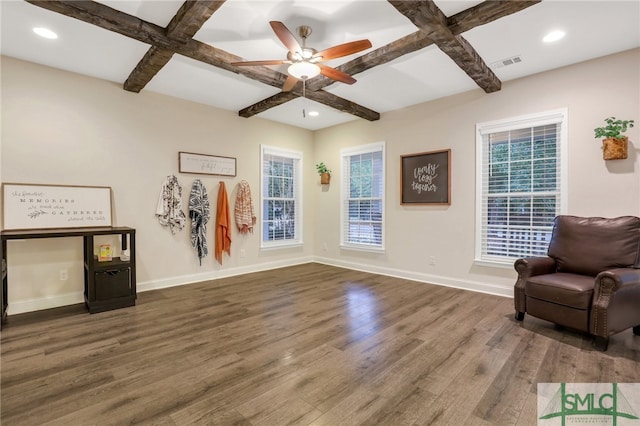 living area featuring hardwood / wood-style flooring, beamed ceiling, and coffered ceiling