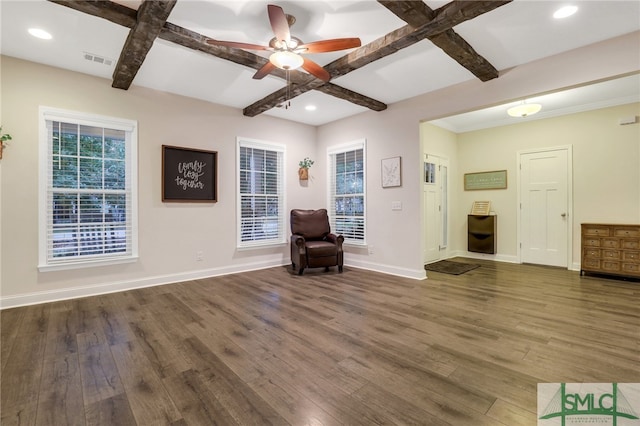 unfurnished room featuring plenty of natural light, dark wood-type flooring, and coffered ceiling