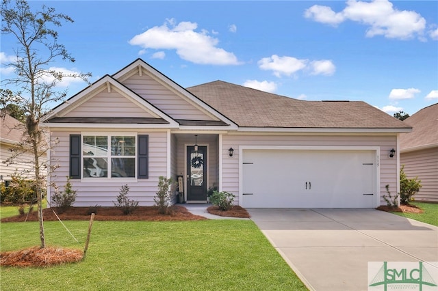 view of front facade featuring a front yard and a garage