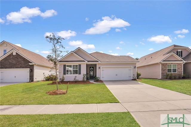 view of front of house featuring a front lawn and a garage