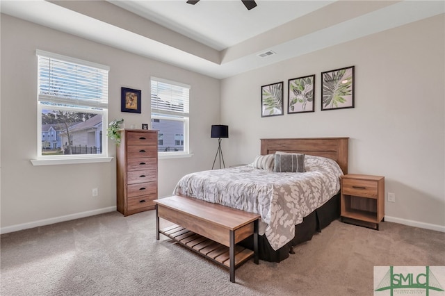 bedroom featuring ceiling fan and light colored carpet