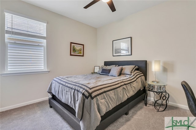 bedroom featuring ceiling fan and light colored carpet