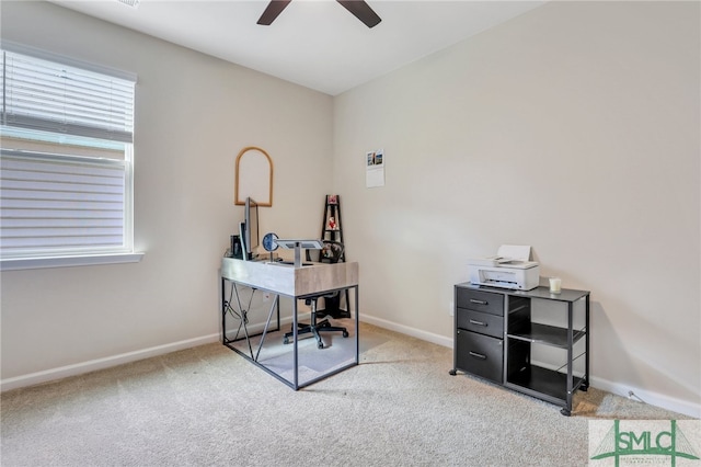 office space with carpet and ceiling fan