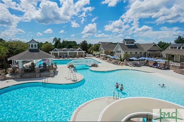 view of pool with a gazebo and a patio