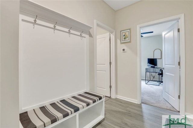 mudroom with hardwood / wood-style flooring