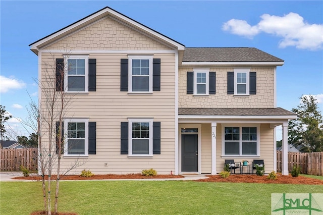 view of front of property featuring a front lawn