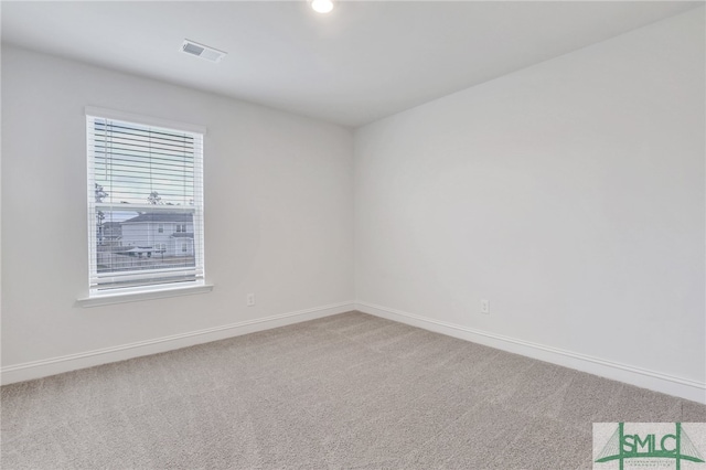 empty room with carpet floors