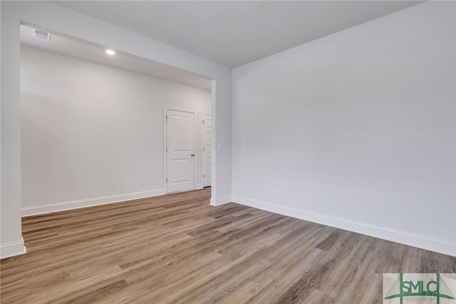 unfurnished room featuring light hardwood / wood-style flooring