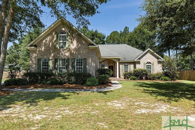 view of front of property with a front lawn