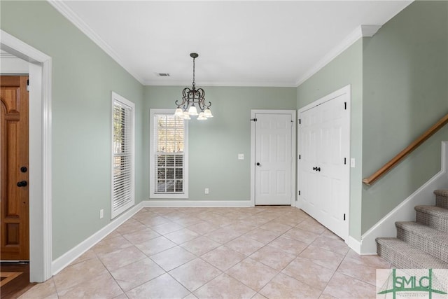 unfurnished dining area featuring stairway, baseboards, visible vents, and ornamental molding