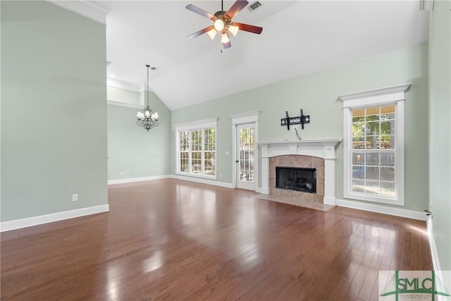 unfurnished living room featuring plenty of natural light, hardwood / wood-style floors, and a tile fireplace