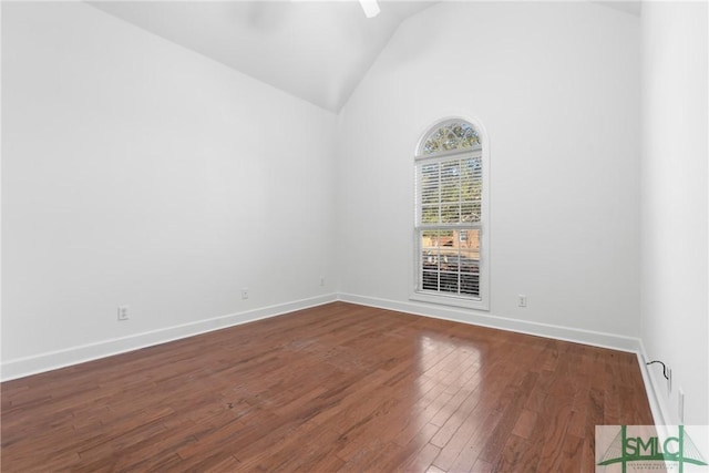 unfurnished room featuring ceiling fan, high vaulted ceiling, baseboards, and wood-type flooring