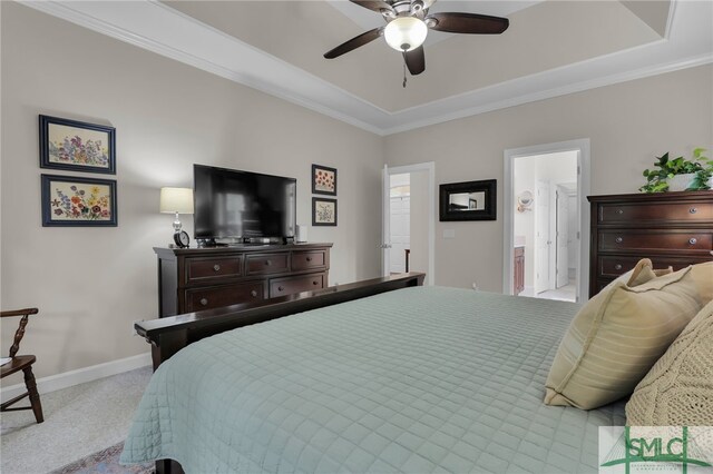 bedroom featuring ceiling fan, ornamental molding, light carpet, and connected bathroom