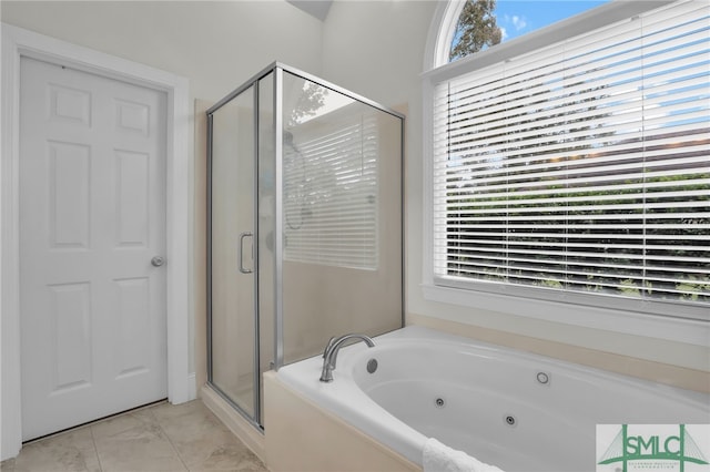 bathroom featuring plus walk in shower