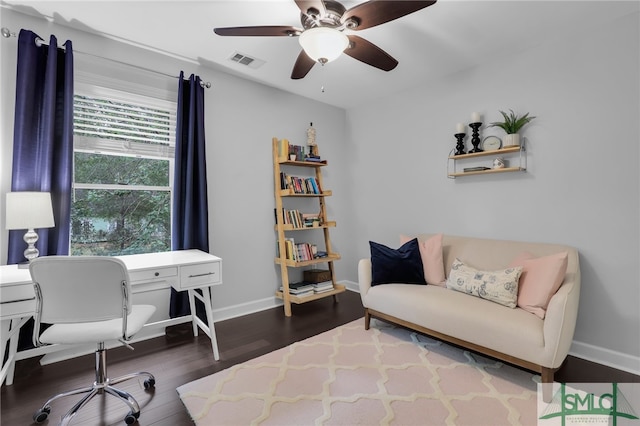 office space with ceiling fan and dark wood-type flooring