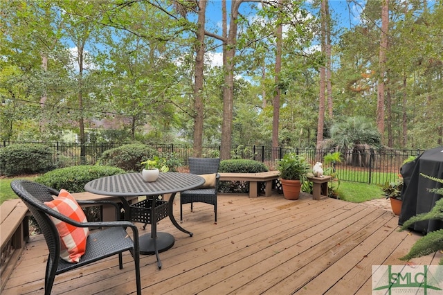 wooden deck with grilling area