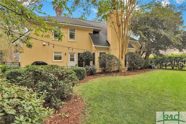 exterior space with a lawn