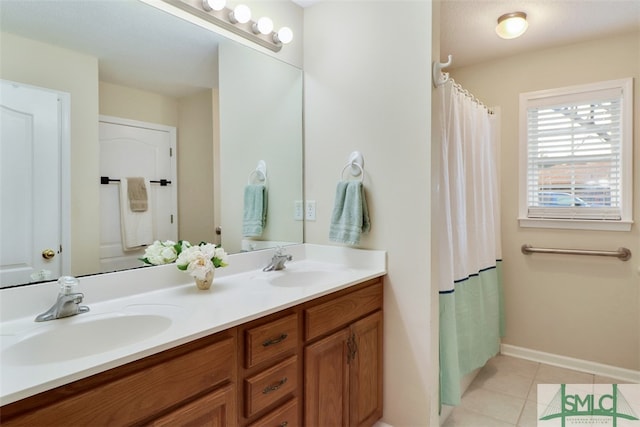 bathroom featuring vanity and tile patterned floors